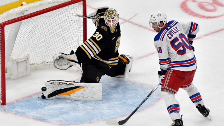 Boston Bruins’ goalie Brandon Bussi blocks a goal attempt by New York Rangers’ Will Cuylle (50) during the third period of an NHL exhibition game at TD Garden in Boston, Sunday, Sept. 24, 2023.