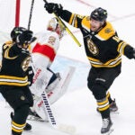 Boston Bruins left wing Brad Marchand (63) and Boston Bruins center Pavel Zacha (18) celebrate his goal for a 2-0 lead during the second period. The Boston Bruins host the Florida Panthers in Game 1 of the Stanley Cup Playoffs on April 18, 2023 at TD Garden in Boston, MA.