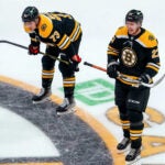 Boston Bruins defenseman Hampus Lindholm (27) returned from the injured list also seen here with Boston Bruins defenseman Charlie McAvoy (73). The Boston Bruins host the New York Rangers in a Garden matinee in Boston, MA on April 23, 2022.