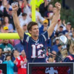 Tom Brady speaking during a half time celebration in Brady’s honor as team owner Robert Kraft applaudes during their game against the Philadelphia Eagles at Gillette Stadium. 