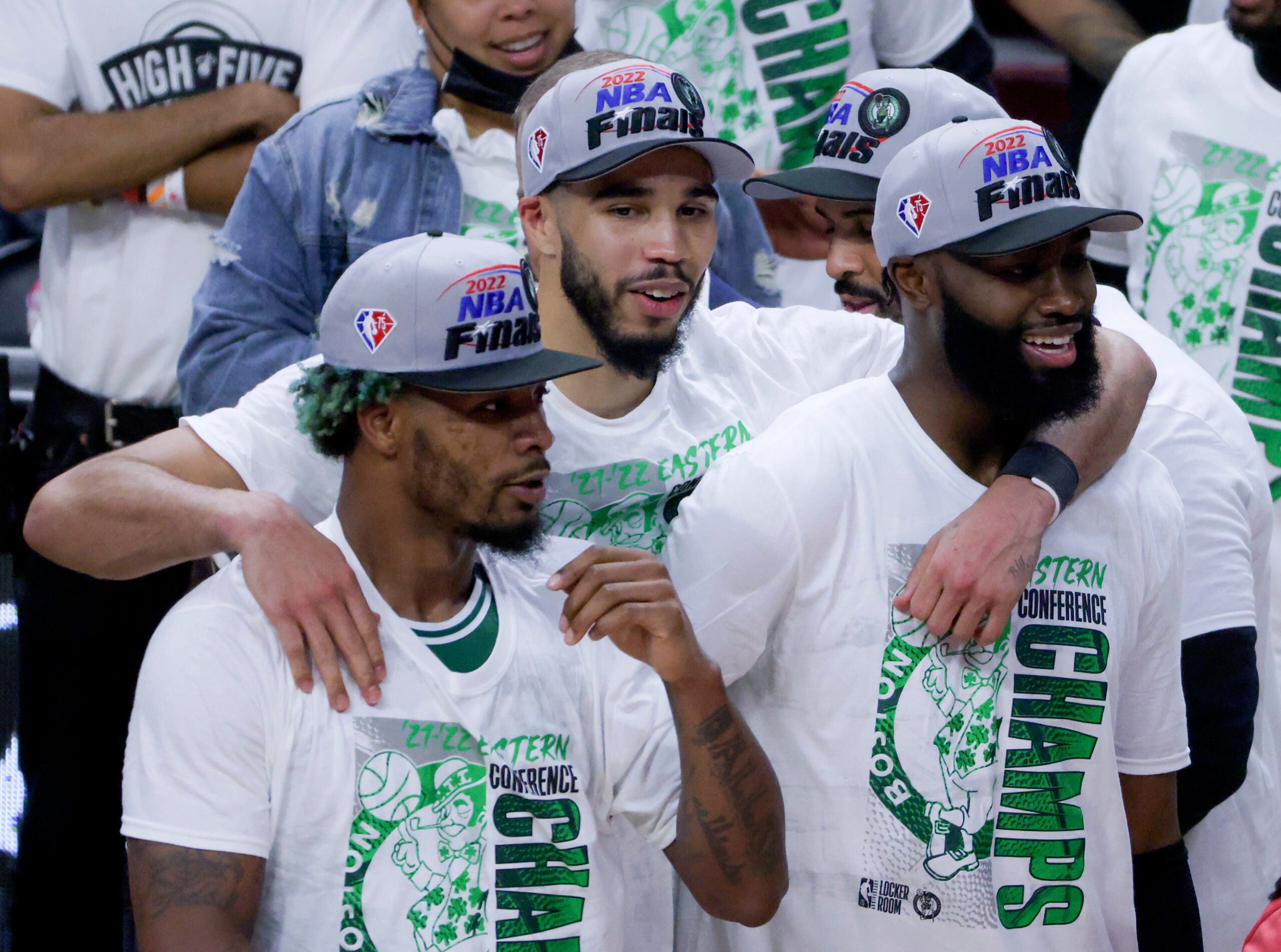 Boston Celtics Marcus Smart, Jayson Tatum, and Jaylen Brown (7) after they defeated the Miami Heat 100-96 winning game 7 of the NBA Eastern Conference Finals at FTX Arena.