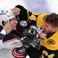 Columbus Billy Sweezey fights with Bruins Jakub Lauko in the 2nd period.