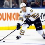 NEW YORK, NEW YORK - OCTOBER 05: Matthew Poitras #51 of the Boston Bruins skates against the New York Rangers at Madison Square Garden on October 05, 2023 in New York City.