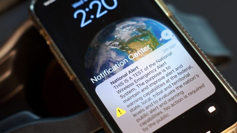 In this photo illustration, a national alert is displayed on a cellphone on October 04, 2023 in Miami, Florida.