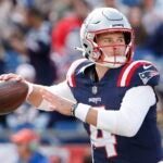 FOXBOROUGH, MASSACHUSETTS - OCTOBER 08: Bailey Zappe #4 of the New England Patriots attempts a pass during the fourth quarter against the New Orleans Saints at Gillette Stadium on October 08, 2023 in Foxborough, Massachusetts.