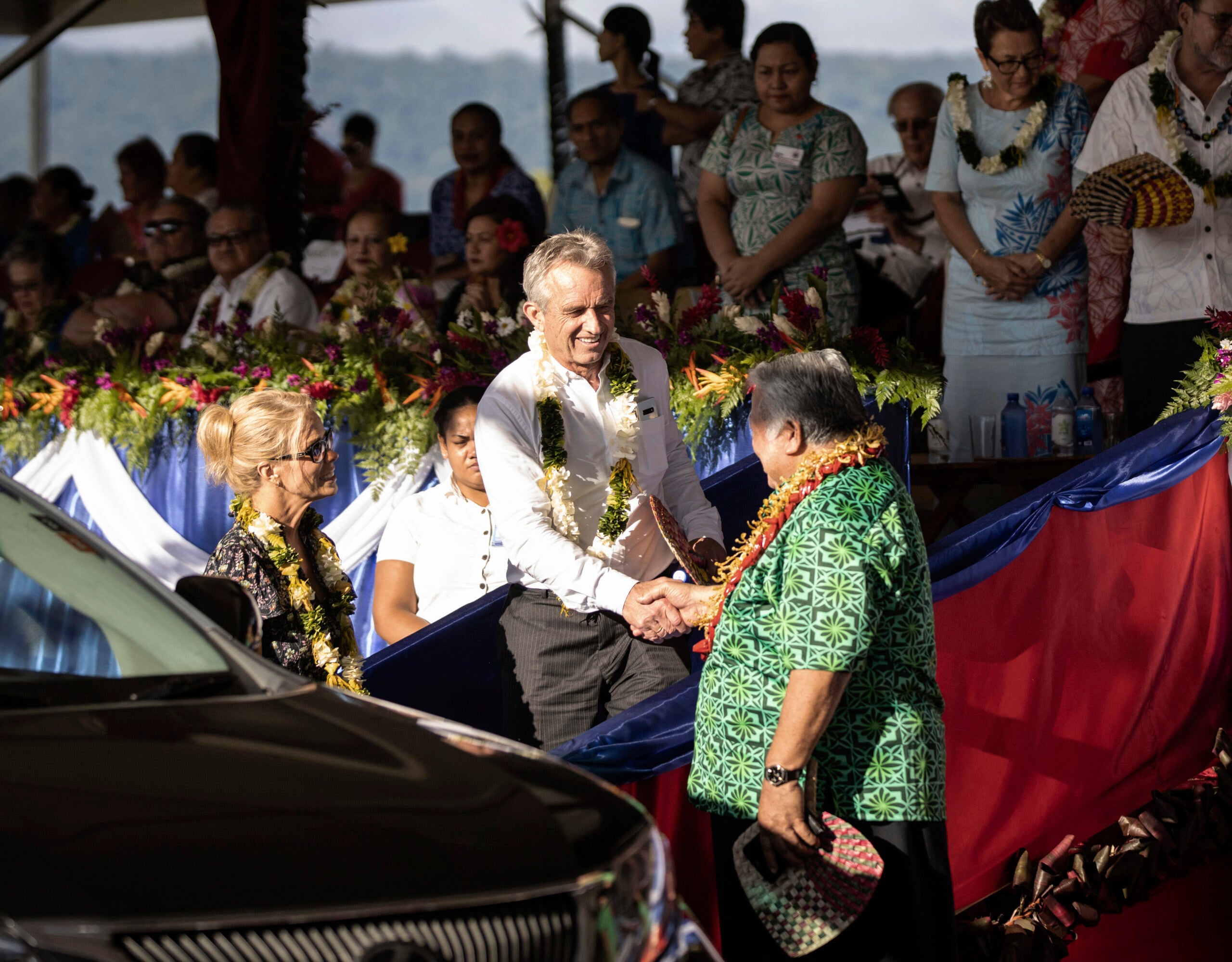 Prime Minister Tuilaepa Sailele Malielegaoi, foreground right, shakes hands with Robert F. Kennedy Jr.