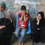 Palestinians mourn relatives killed in the Israeli bombardment of the Gaza Strip.