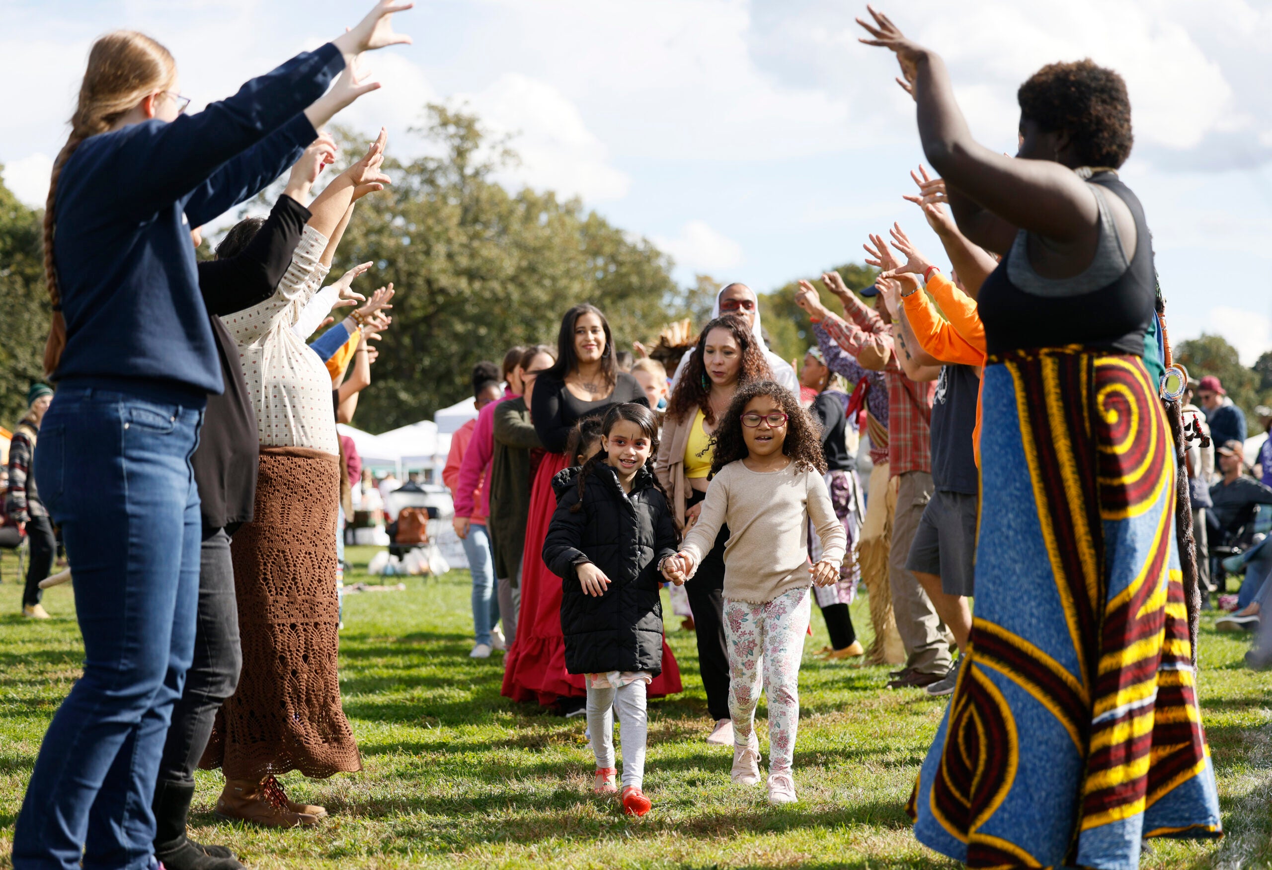 People took part in a communal dance during an Indigenous Peoples Day celebration in Newton on Oct. 9, 2023.