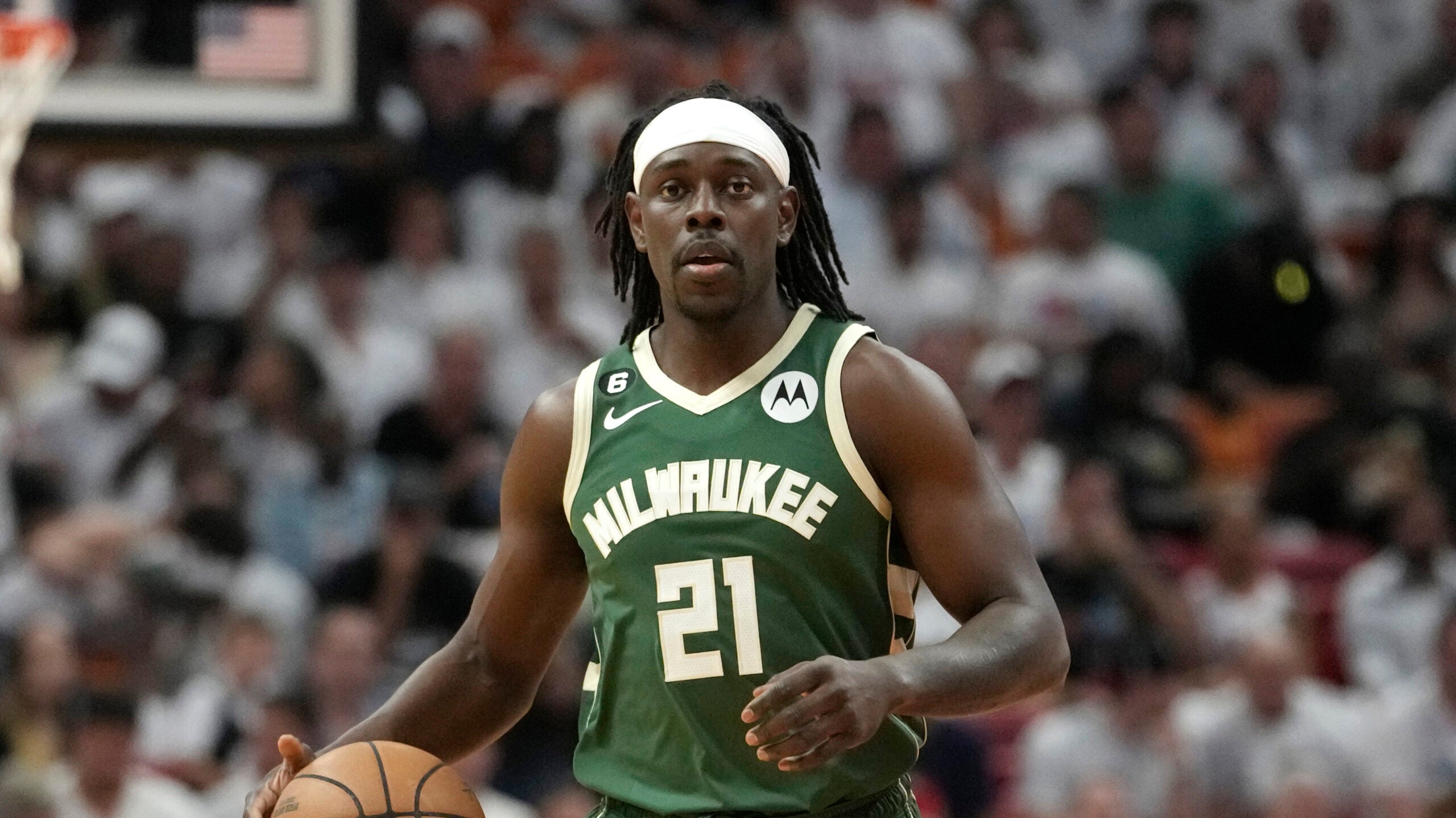 Milwaukee Bucks guard Jrue Holiday moves the ball down the court during the first half of Game 3 in a first-round NBA basketball playoff series against the Miami Heat, April 22, 2023, in Miami. Holiday is being traded to the Boston Celtics, a person with knowledge of the agreement said Sunday, Oct. 1 2023, a move that comes just four days after being sent to the Portland Trail Blazers in the deal that sent Damian Lillard to the Bucks.