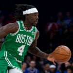 Boston Celtics' Jrue Holiday in action during the preseason NBA basketball game against the Philadelphia 76ers, Wednesday, Oct. 11, 2023, in Philadelphia. The Celtics won 112- 101.