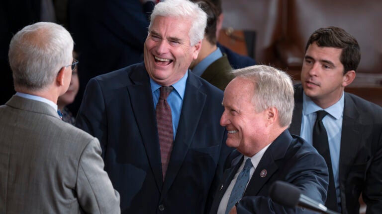 House Majority Whip Tom Emmer, R-Minn., center, is flanked by Rep. Patrick McHenry, R-N.C., and Rep. David Joyce, R-Ohio.