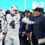 Dallas Cowboys quarterback Dak Prescott (4) talks with Cowboys head coach Mike McCarthy.