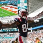 MIAMI GARDENS, FLORIDA - OCTOBER 29: Kendrick Bourne #84 of the New England Patriots celebrates a receiving touchdown during the first quarter against the Miami Dolphins at Hard Rock Stadium on October 29, 2023 in Miami Gardens, Florida.