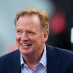 NFL commissioner Roger Goodell watches warm ups before an NFL football game.