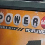 A display panel advertises tickets for a Powerball drawing.