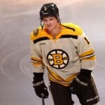 Trent Frederic #11 of the Boston Bruins is announced before the Bruins home opener against the Chicago Blackhawks at TD Garden on October 11, 2023 in Boston, Massachusetts.