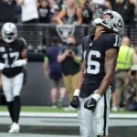 Jakobi Meyers #16 of the Las Vegas Raiders celebrates after catching a touchdown during the second quarter against the New England Patriots at Allegiant Stadium on October 15, 2023 in Las Vegas, Nevada.