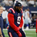 New England Patriots linebacker Matthew Judon (9) walks off the field after an injury against the Dallas Cowboys during an NFL Football game in Arlington, Texas, Sunday, Nov. 1, 2023.