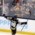 Boston Bruins' David Pastrnak celebrates his goal on a penalty shot during the second period of an NHL hockey game against the Nashville Predators, Saturday, Oct. 14, 2023, in Boston.