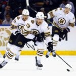 NEW YORK, NEW YORK - OCTOBER 05: John Beecher #19 of the Boston Bruins skates against the New York Rangers at Madison Square Garden on October 05, 2023 in New York City.