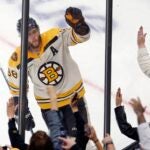 Boston Bruins' David Pastrnak celebrates after scoring on a penalty shot during the third period of the team's NHL hockey game against the Detroit Red Wings, Saturday, Oct. 28, 2023, in Boston.