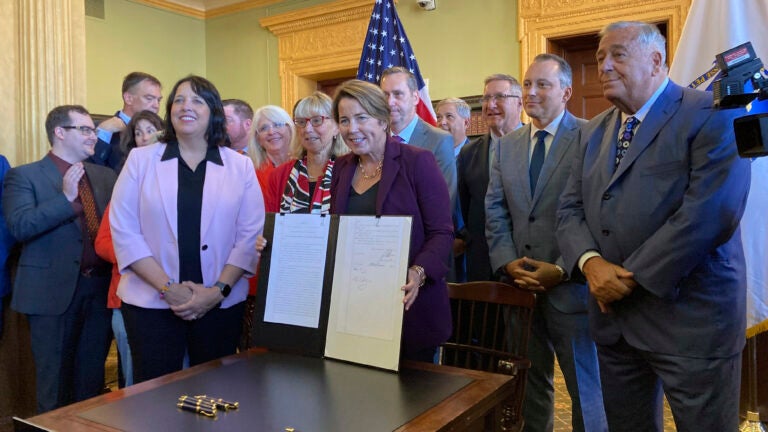 Massachusetts Gov. Maura Healey signed a tax relief package at the Massachusetts Statehouse.