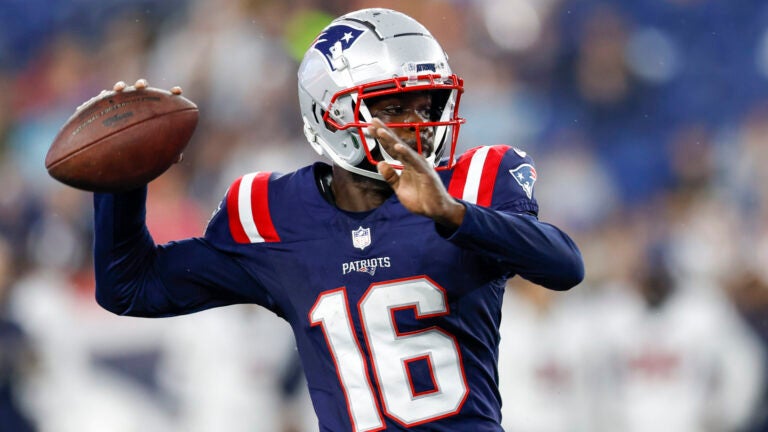 New England Patriots quarterback Malik Cunningham (16) makes a pass during the second half of an NFL pre-season football game against the Houston Texans, Thursday, Aug. 10, 2023, in Foxborough, Mass.