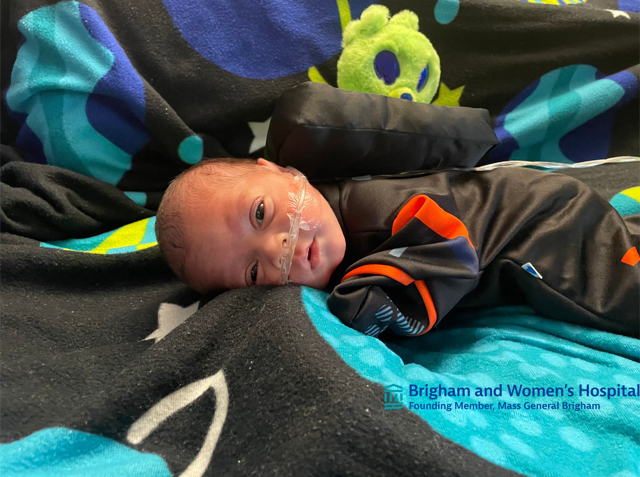 Baby in a skeleton costume. 