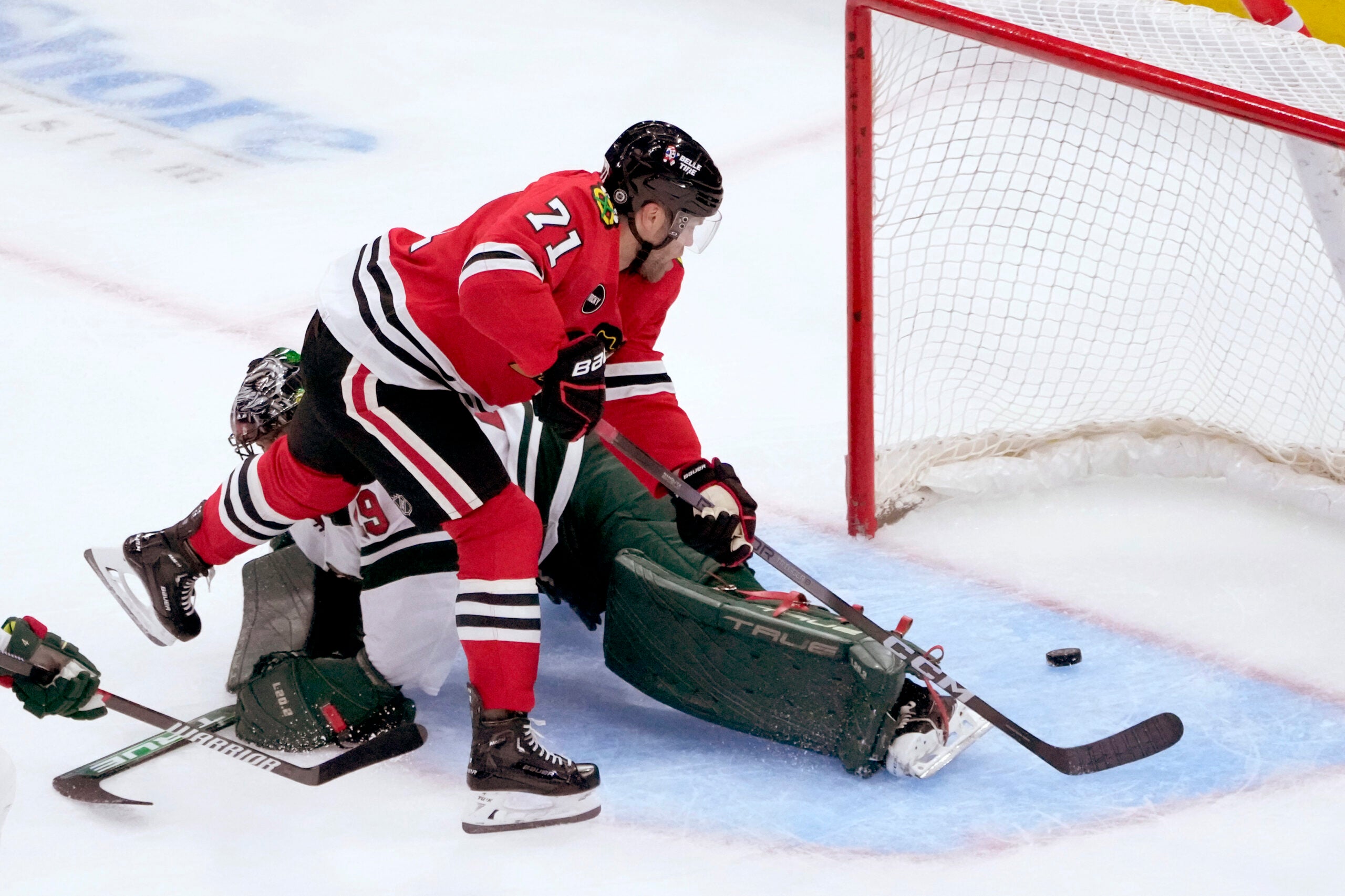 Blackhawks player puts his baby in the Stanley Cup