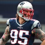Patriots defensive lineman Chris Long is pictured on the field during the game vs. the Dolphins.