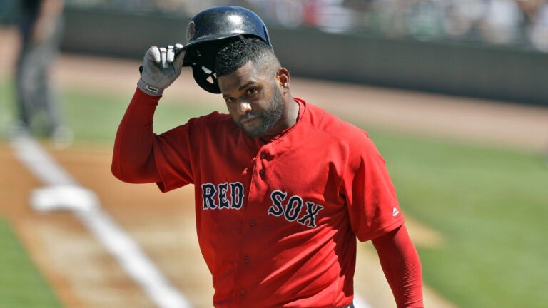 Boston Red Sox's Pablo Sandoval heads back to the dugout after striking out against Pittsburgh Pirates starting pitcher Chad Kuhl during the first inning of a spring training baseball game, Saturday, March 4, 2017, in Bradenton, Fla.