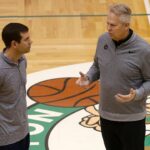 Waltham, MA--4/23/2018-- Celtics Head Coach Brad Stevens (L) chats with Celtics General Manager Danny Ainge during practice.