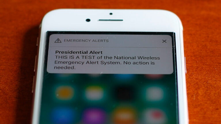 The first test of the national wireless emergency system by the Federal Emergency Management Agency is shown on a cellular phone.