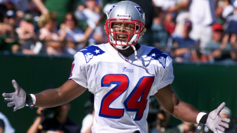 Patriots All Pro cornerback Ty Law can't believe that he has just been called for pass interference. He was right, as the refs got together and changed the call to no foul.