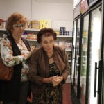 Home Health Care aid, Lora Lodkina, left, helps Galina Zhidkova in the morning with some shopping in Brighton, MA on Aug. 27, 2019.