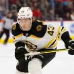 Boston Bruins center Danton Heinen (43) plays against the Detroit Red Wings in the first period of an NHL hockey game Sunday, Feb. 9, 2020, in Detroit.