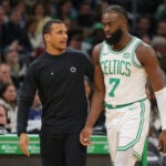 Boston MA 10/17/23 Boston Celtics head coach Joe Mazzulla talking to guard Jaylen Brown (7) against the New York Knicks during first quarter NBA action at TD Garden.