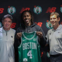 The Boston Celtics introduced their new player at an afternoon press-conference. Left to right are Stephen Pagliuca , Wyc Grousbeck ,Jrue Holiday. , and Brad Stevens.
