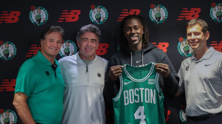 The Boston Celtics introduced their new player at an afternoon press-conference. Left to right are Stephen Pagliuca , Wyc Grousbeck ,Jrue Holiday. , and Brad Stevens.