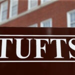 A photo of a sign at Tufts University's campus.