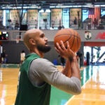 The Boston Celtics held their first day of training camp at the Auerbach center on Tuesday. Derrick White makes a throw.