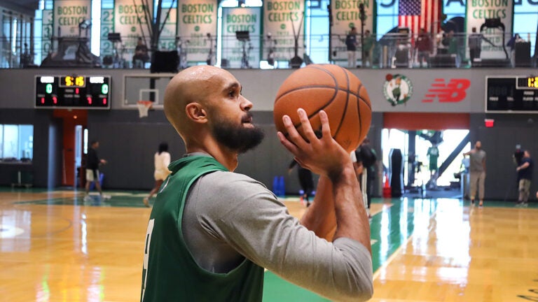 The Boston Celtics held their first day of training camp at the Auerbach center on Tuesday. Derrick White makes a throw.