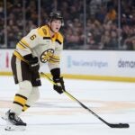BOSTON, MASSACHUSETTS - NOVEMBER 02: In his first NHL game Mason Lohrei #6 of the Boston Bruins skates against the Toronto Maple Leafs during the first period at TD Garden on November 02, 2023 in Boston, Massachusetts.
