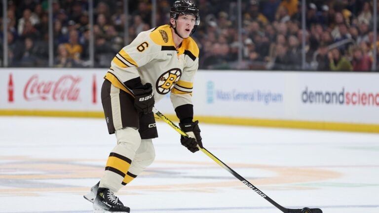 BOSTON, MASSACHUSETTS - NOVEMBER 02: In his first NHL game Mason Lohrei #6 of the Boston Bruins skates against the Toronto Maple Leafs during the first period at TD Garden on November 02, 2023 in Boston, Massachusetts.