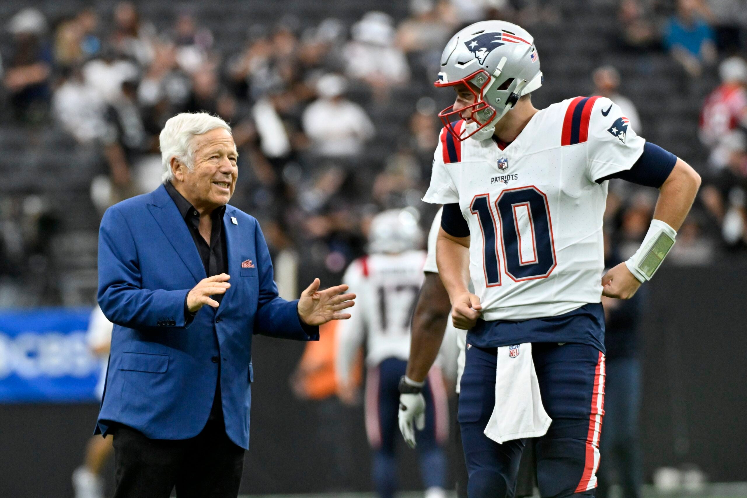 Robert Kraft and Mac Jones