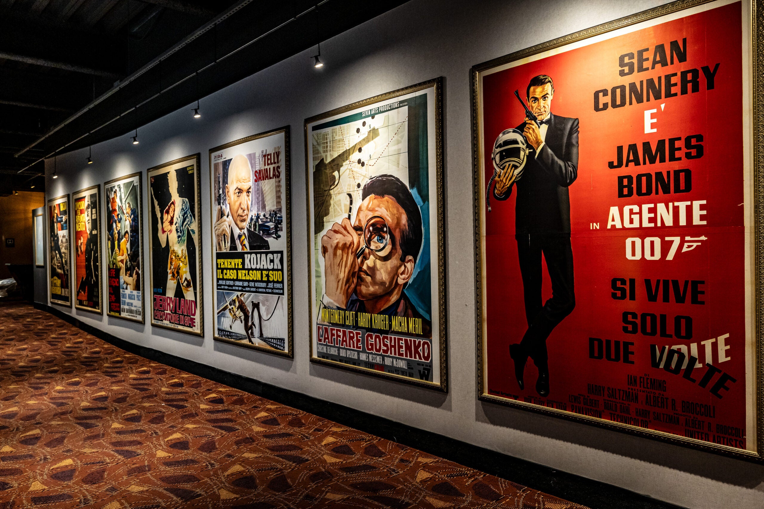 Posters adorn the wall of Alamo Drafthouse Cinema Boston.