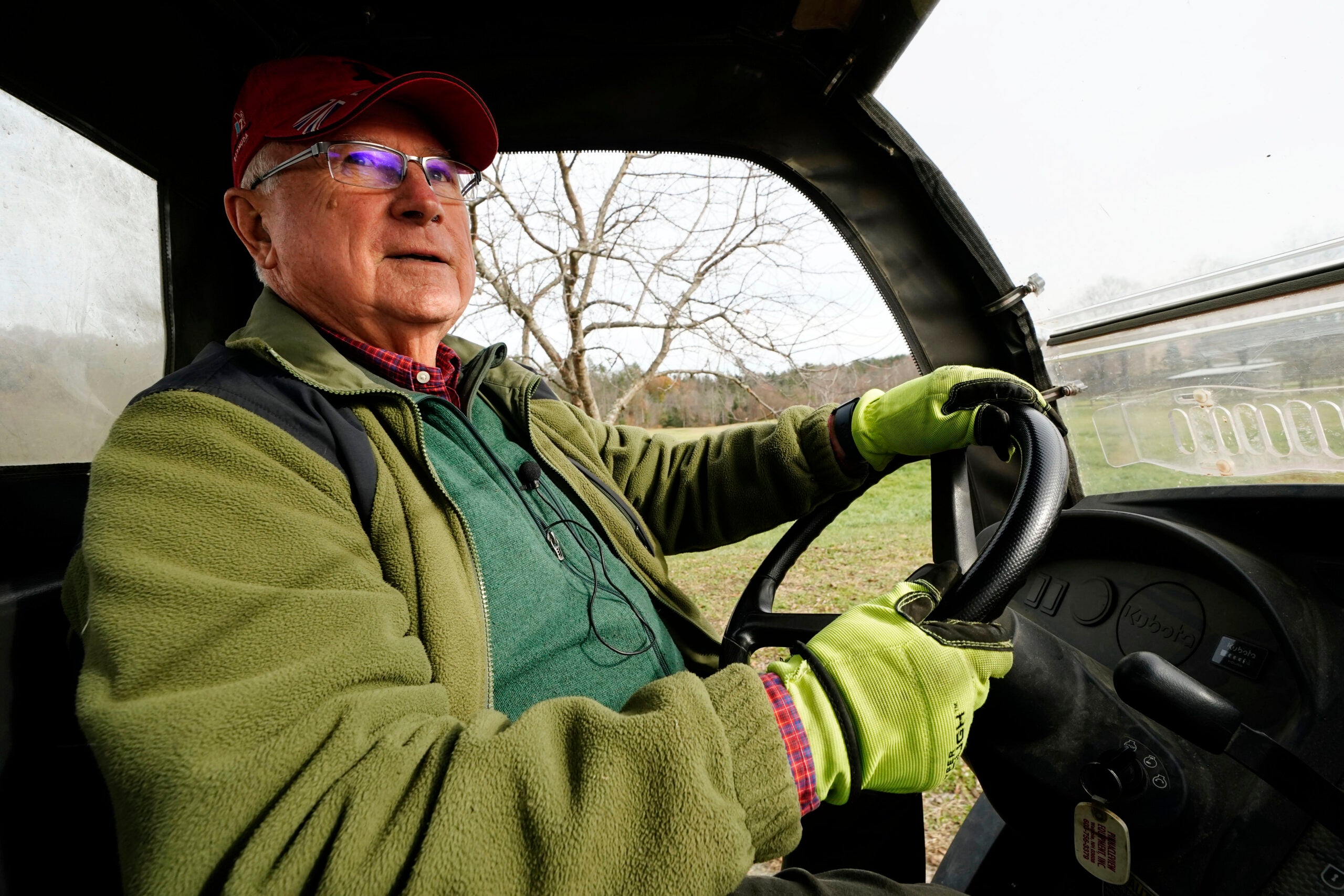 Trailer park owner Ed Smith drives a four-wheeler at Stearns Park.