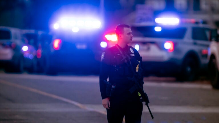 Police work at the scene of a shooting at New Hampshire Hospital.