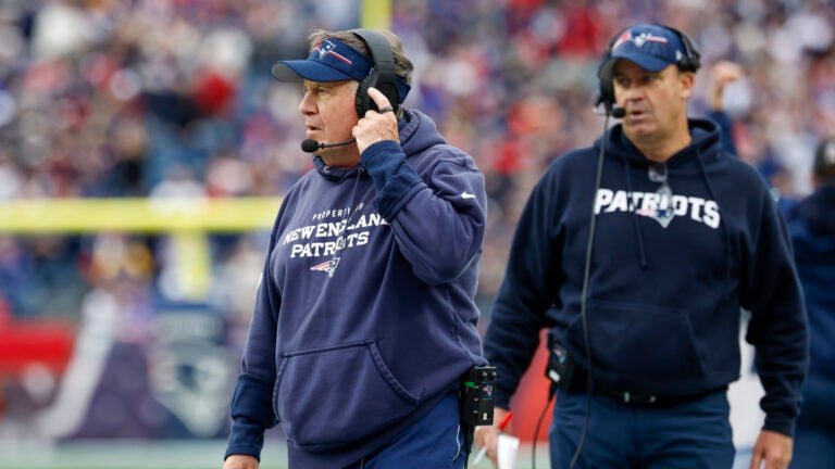 New England Patriots head coach Bill Belichick and offensive coordinator/quarterbacks coach Bill O'Brien react during the second half of an NFL football game against the Buffalo Bills on Sunday, Oct. 22, 2023, in Foxborough, Mass.