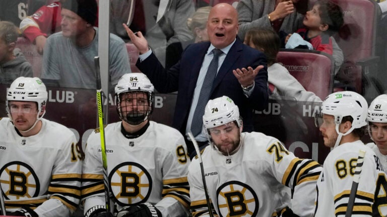 Bruins head coach Jim Montgomery reacts to a call during the first period.
